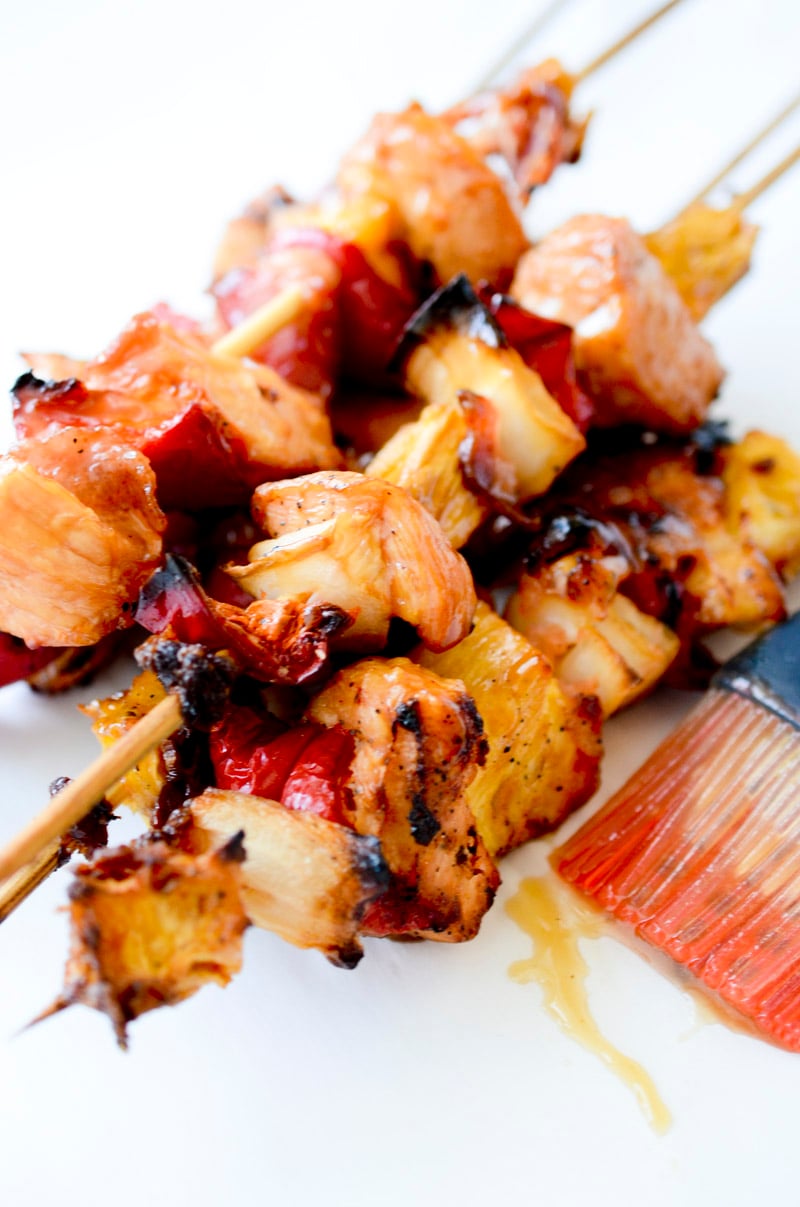 Chicken Pineapple Bacon Kabobs / Pineapple Chicken Kabobs - The Clean Eating Couple / A light marinade of soy sauce, brown sugar, and sherry with sesame and spices tenderizes these chicken pineapple kabobs into an aloha grilled dream of a dish!