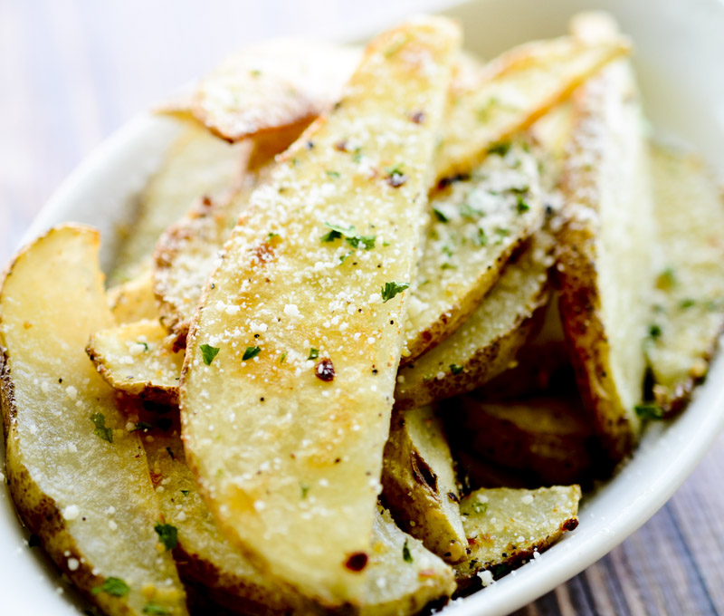 Garlic Parmesan Fries - these fries are baked in the oven and loaded with flavor! 