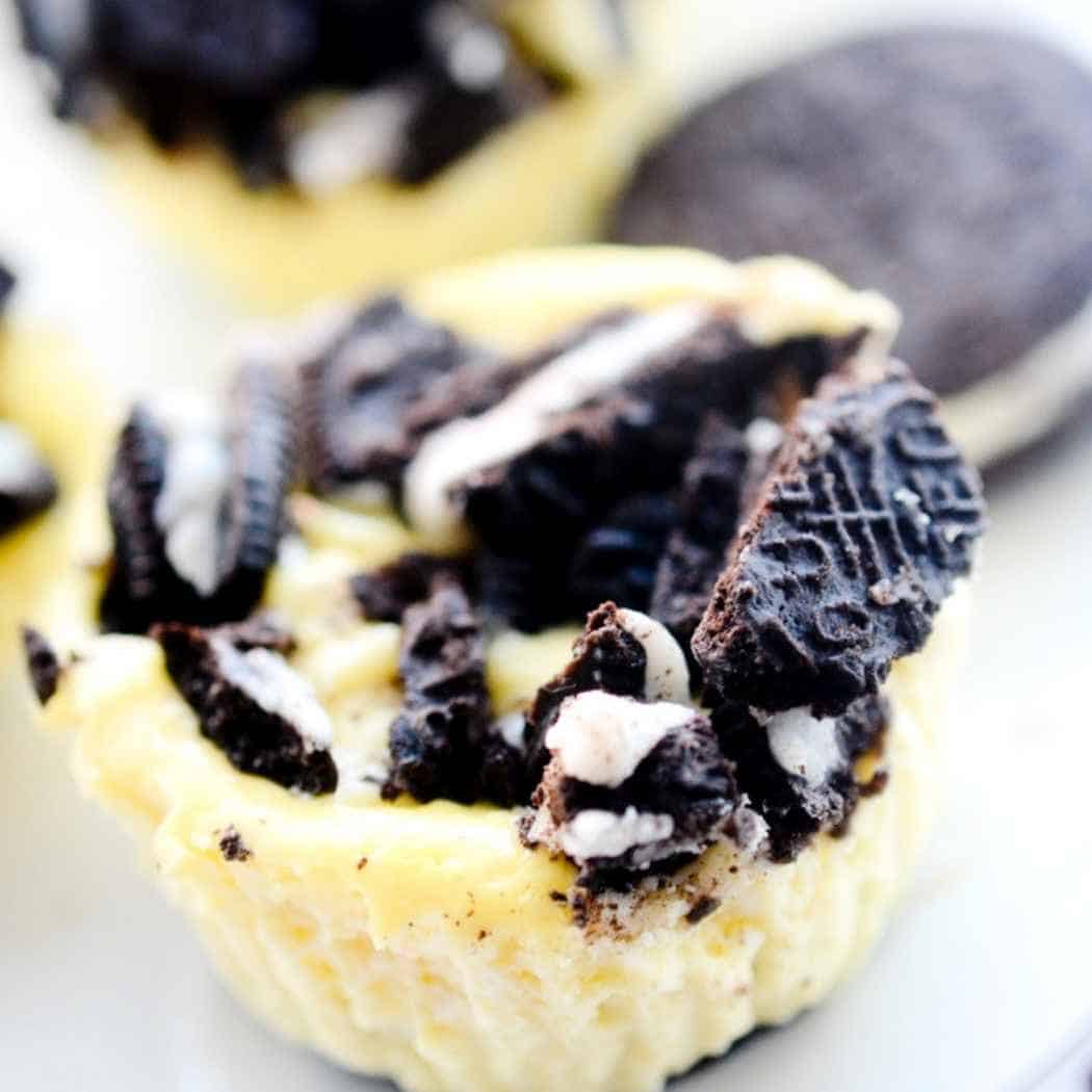 Mini Oreo cheesecakes with a cookie crust.