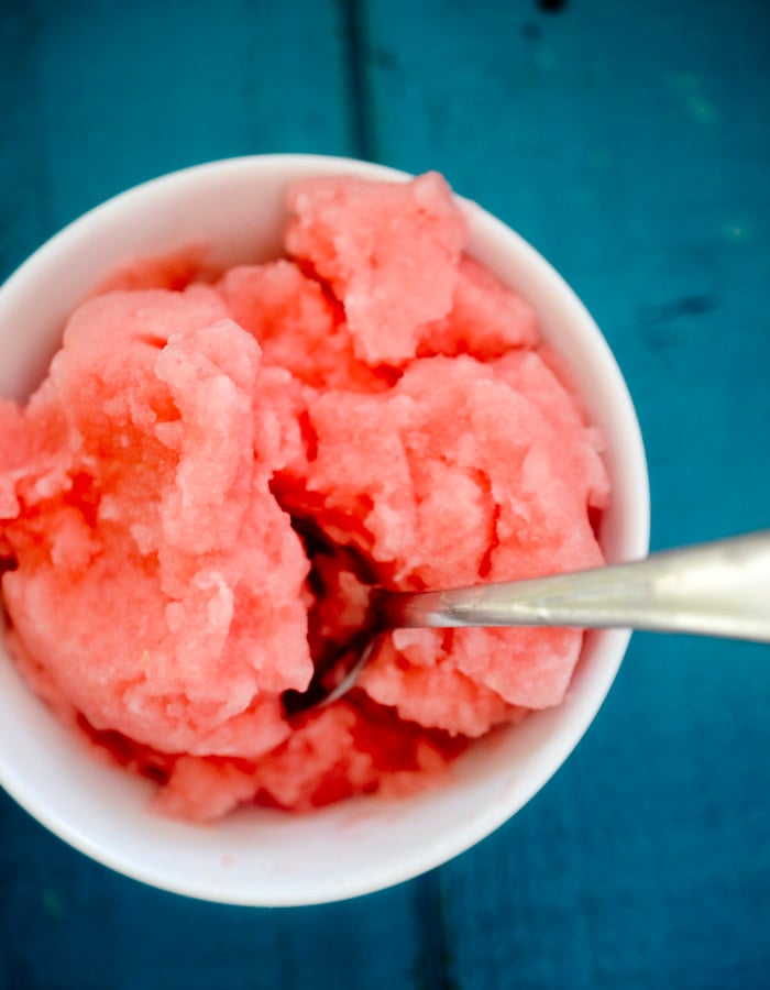 Blended watermelon sorbet made from a NInja Creami in a white bowl.