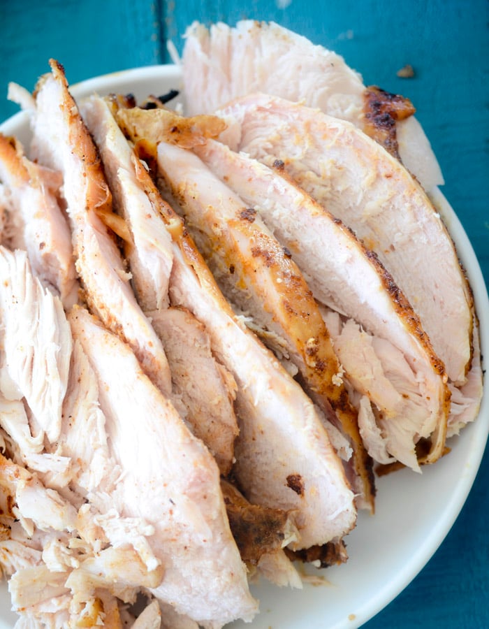 Ninja Foodi Grill Smoked Applewood Smoked Turkey Breast on a white plate.