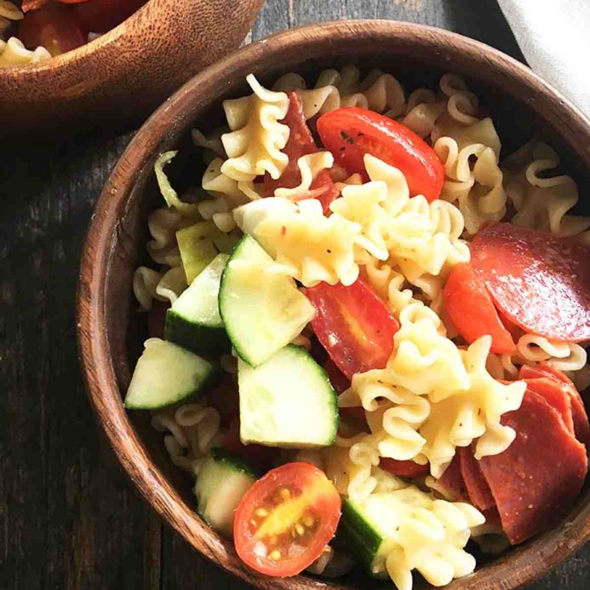 Italian pasta salda with cherry tomatoes and cucumbers.