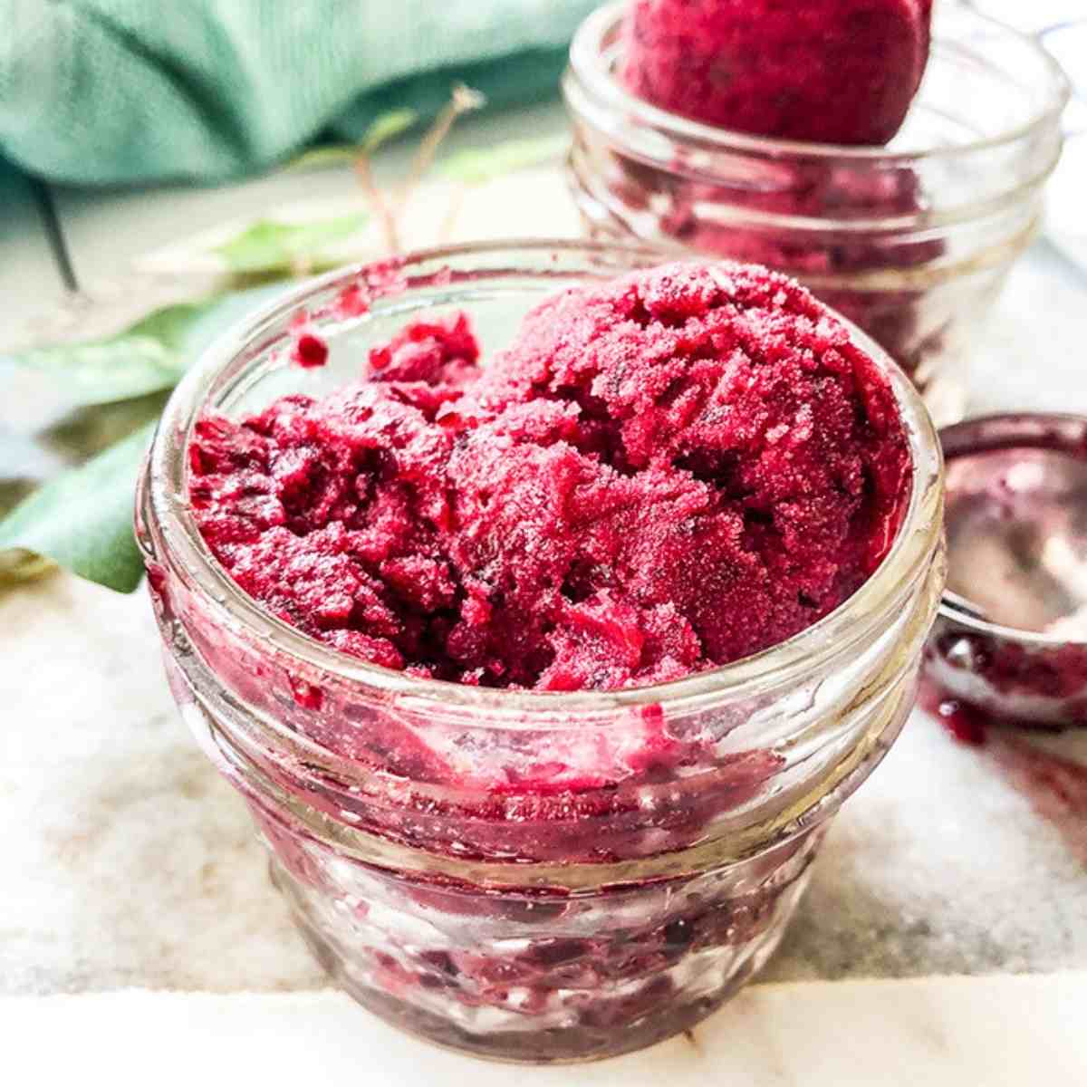 Ninja creami cherry sorbet in a glass jar.