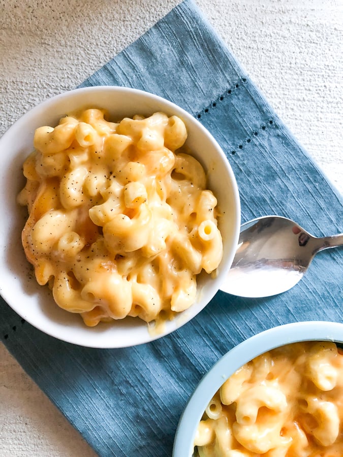 crock pot mac and cheese in white dish.