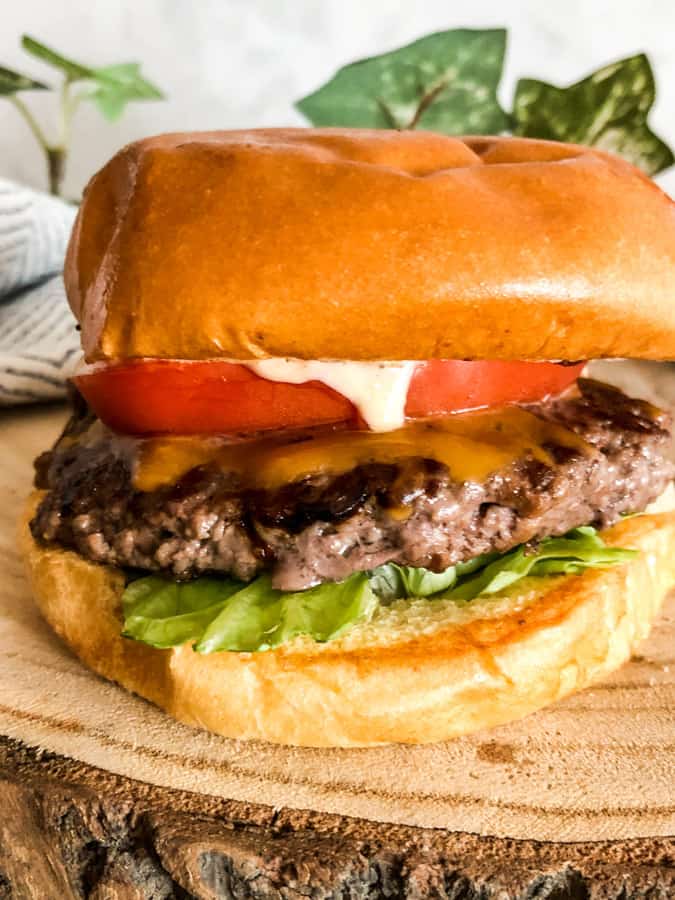 Smashed Cheeseburgers with Caramelized Onions