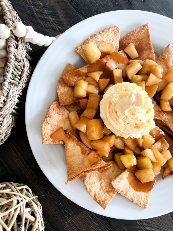 Apple pie nachos topped with pumpkin spiced whipped cream. 