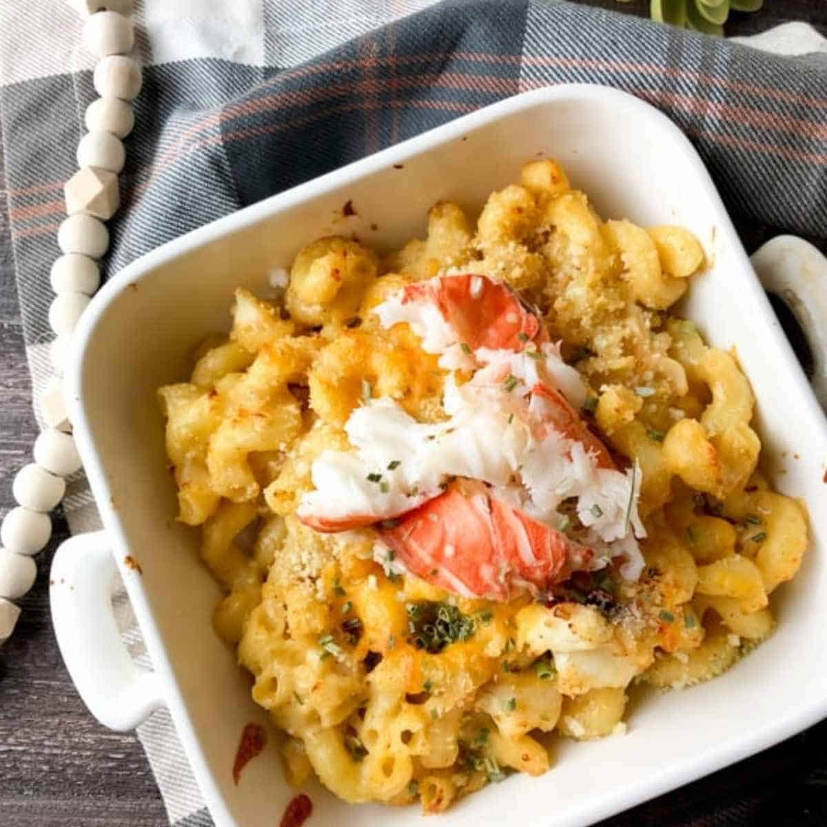 Ina Garten Lobster Mac and Cheese in a White Casserole Dish. 
