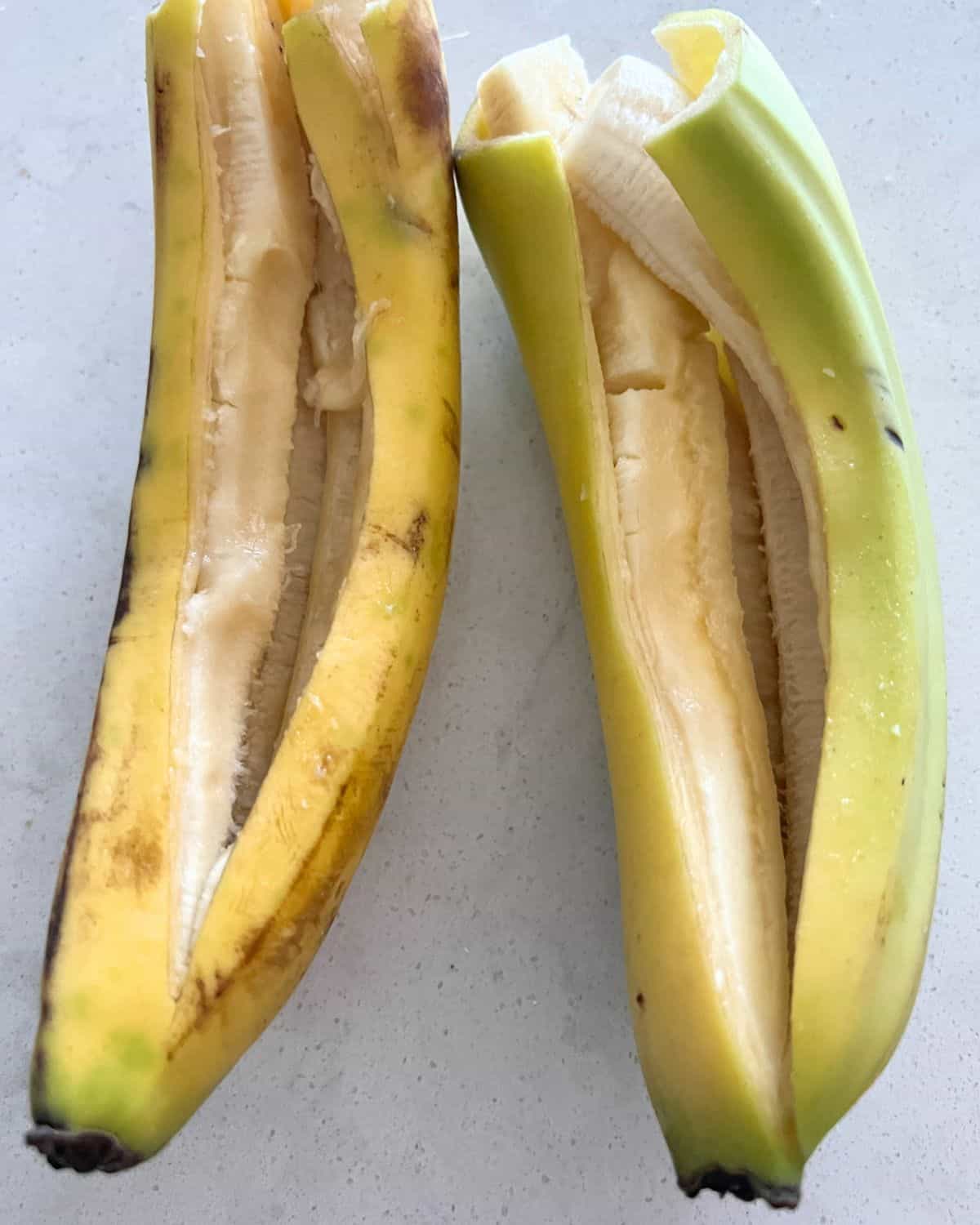 Slip open banana peels ready for toppings. 