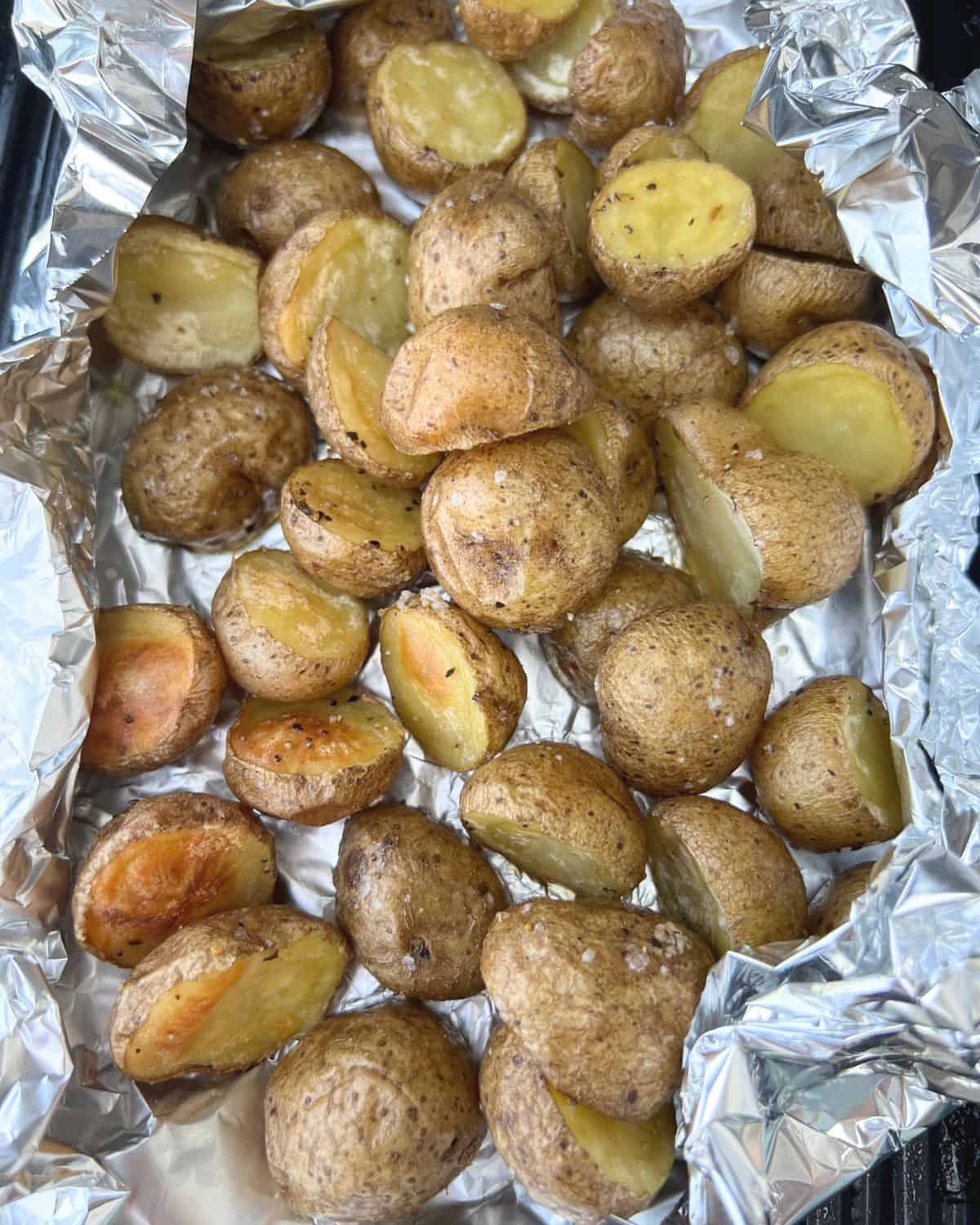 Smoked seasoned yellow potatoes with salt, olive oil, and pepper.