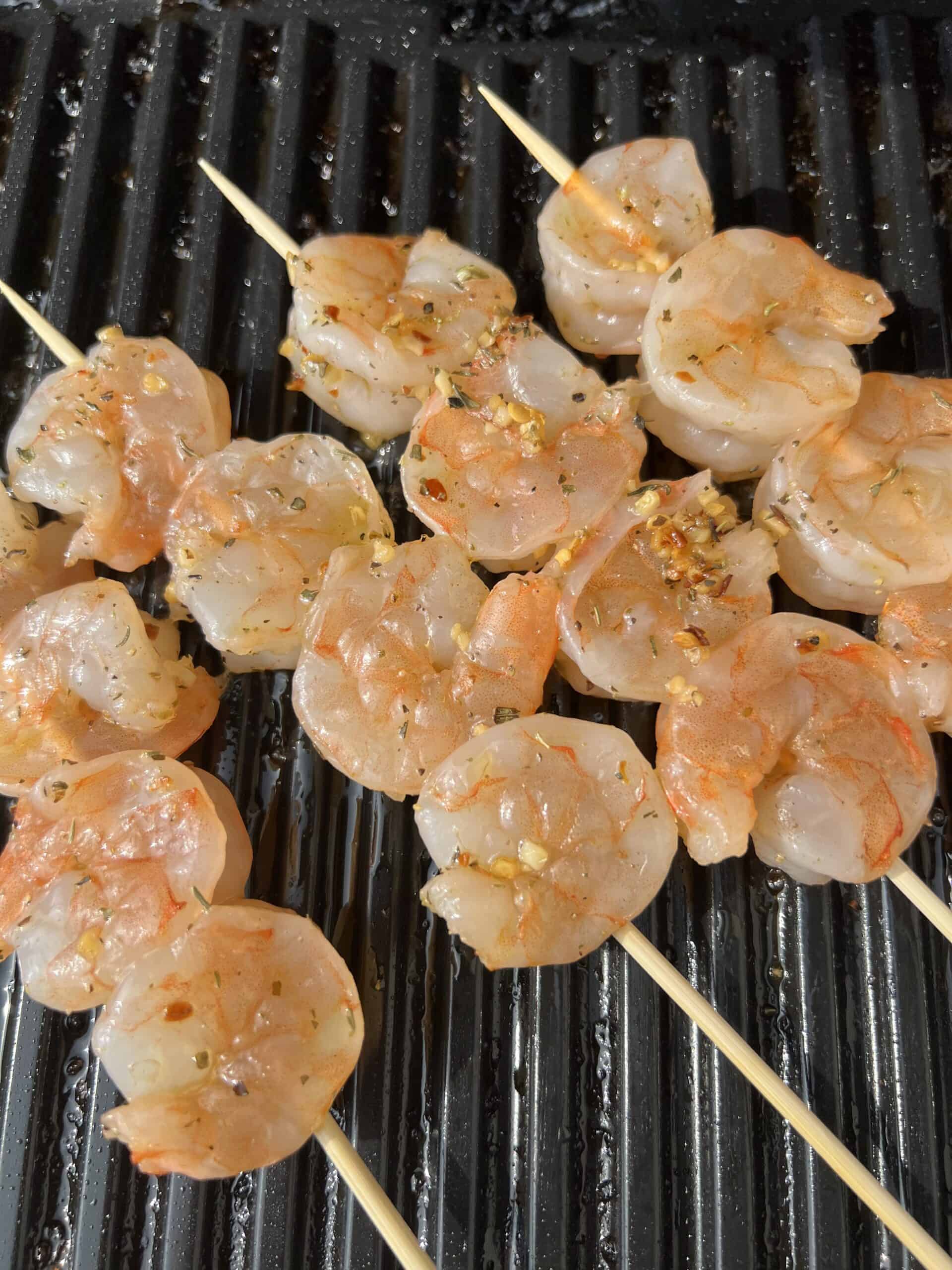Shrimp skewers on a grill. 