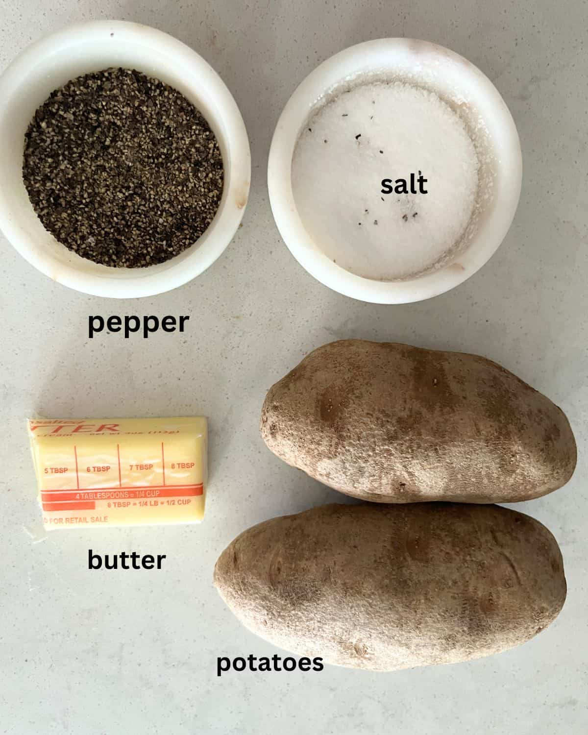 Ingredients needed for air fried baked potatoes.