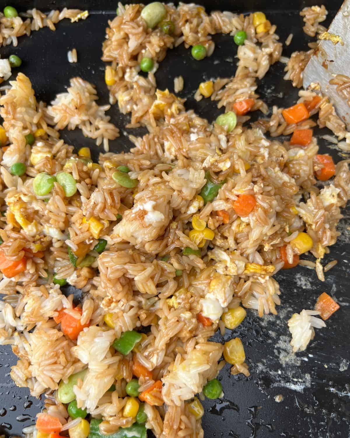 Completed fried rice on a Blackstone griddle. 