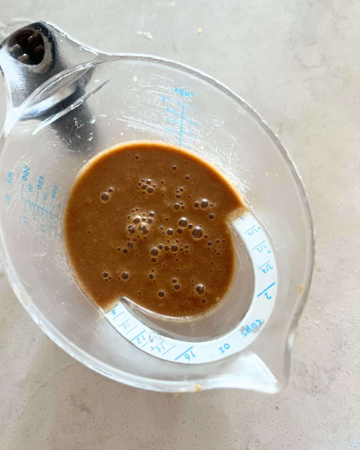 Peanut Sauce ingredients in measuring cup. 