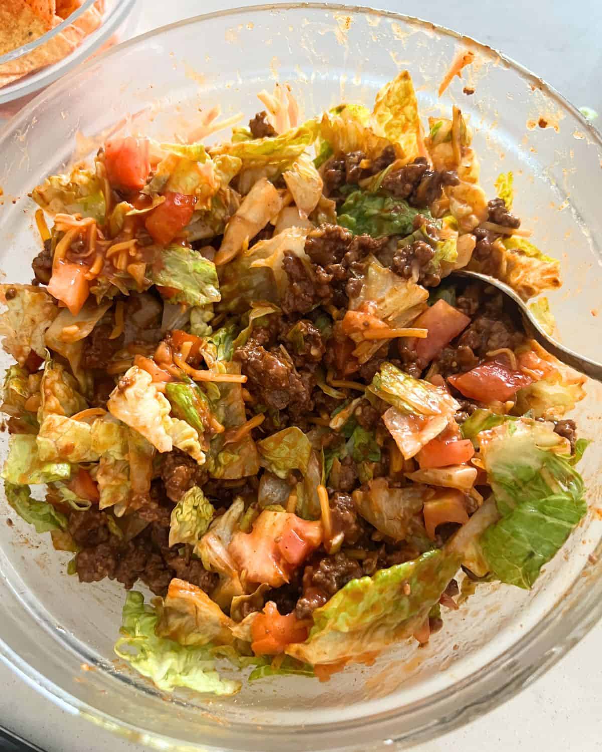 Ingredients for Dorito Taco Salad in a bowl. 