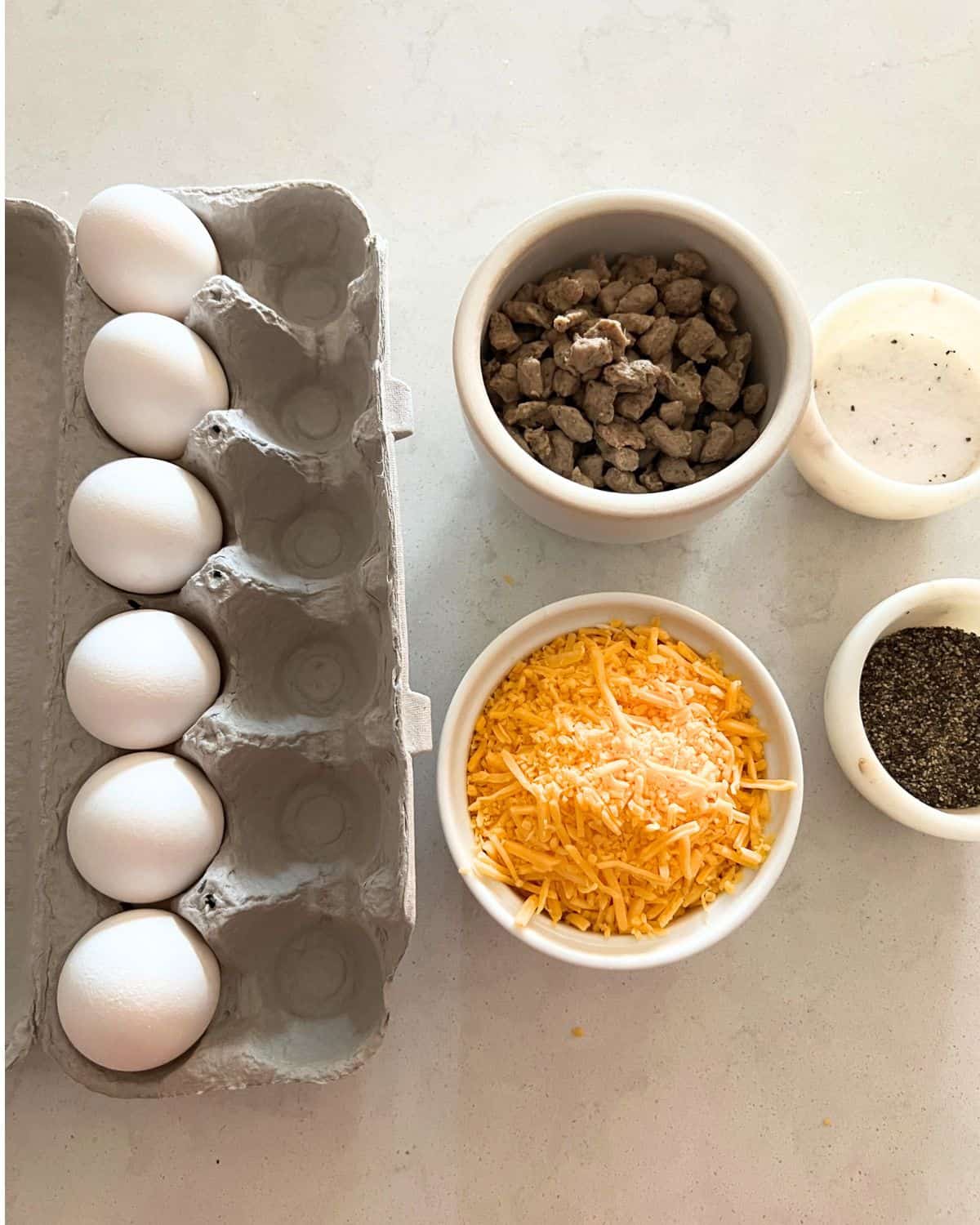 Ingredients needed for Egg and Sausage Muffins. 