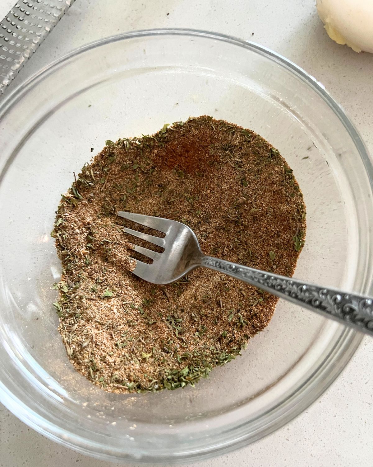 Jerk seasoning ingredients in a bowl. 