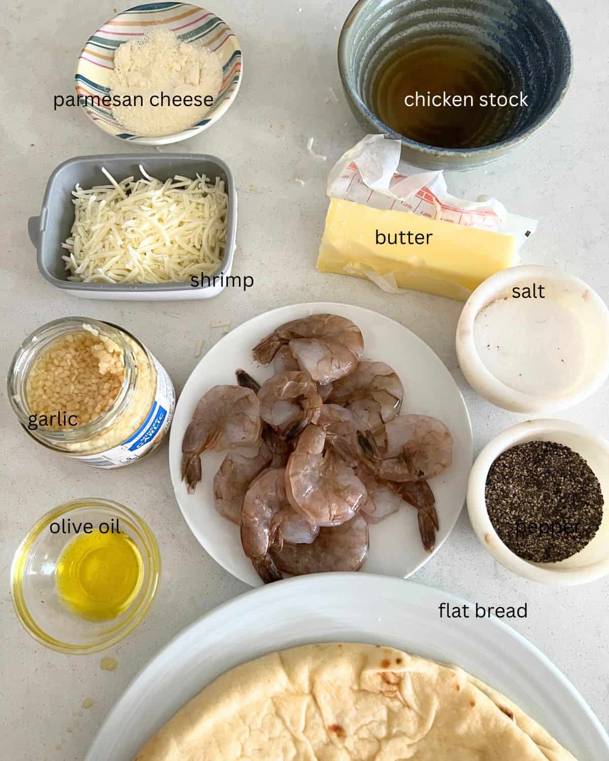 Ingredients for shrimp scampi pizza. 