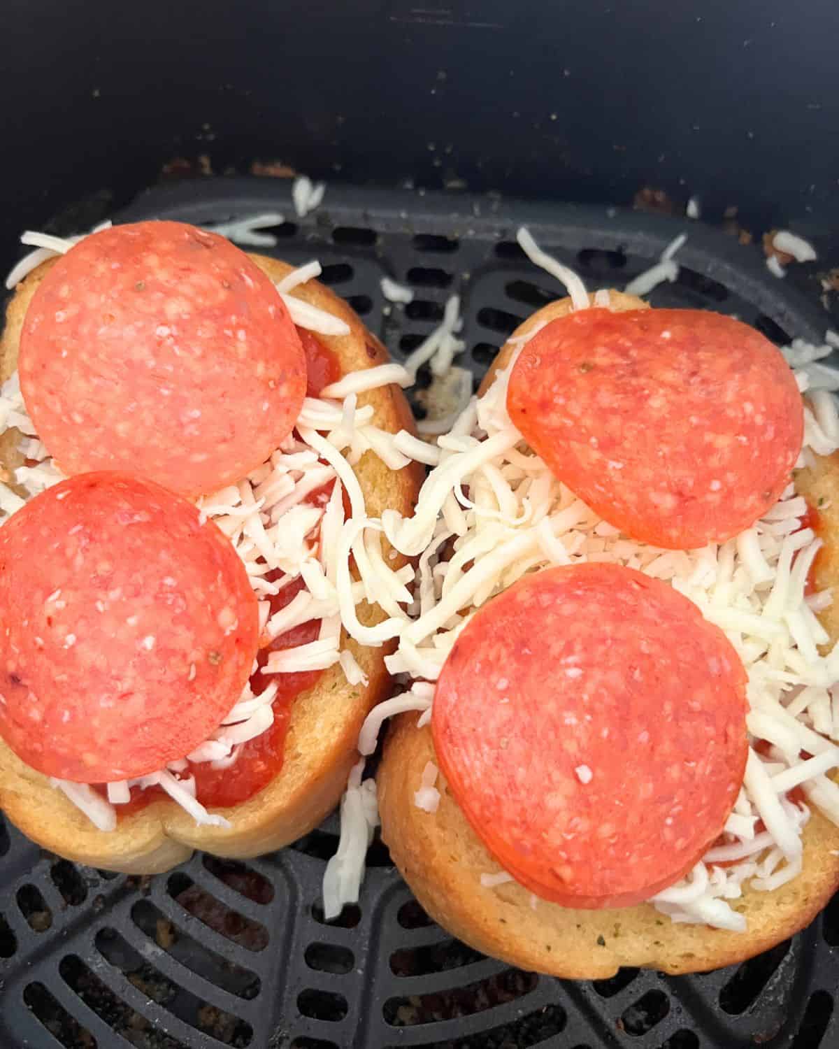 Texas Toast Garlic Bread topped with sauce, cheese, and pepperoni. 