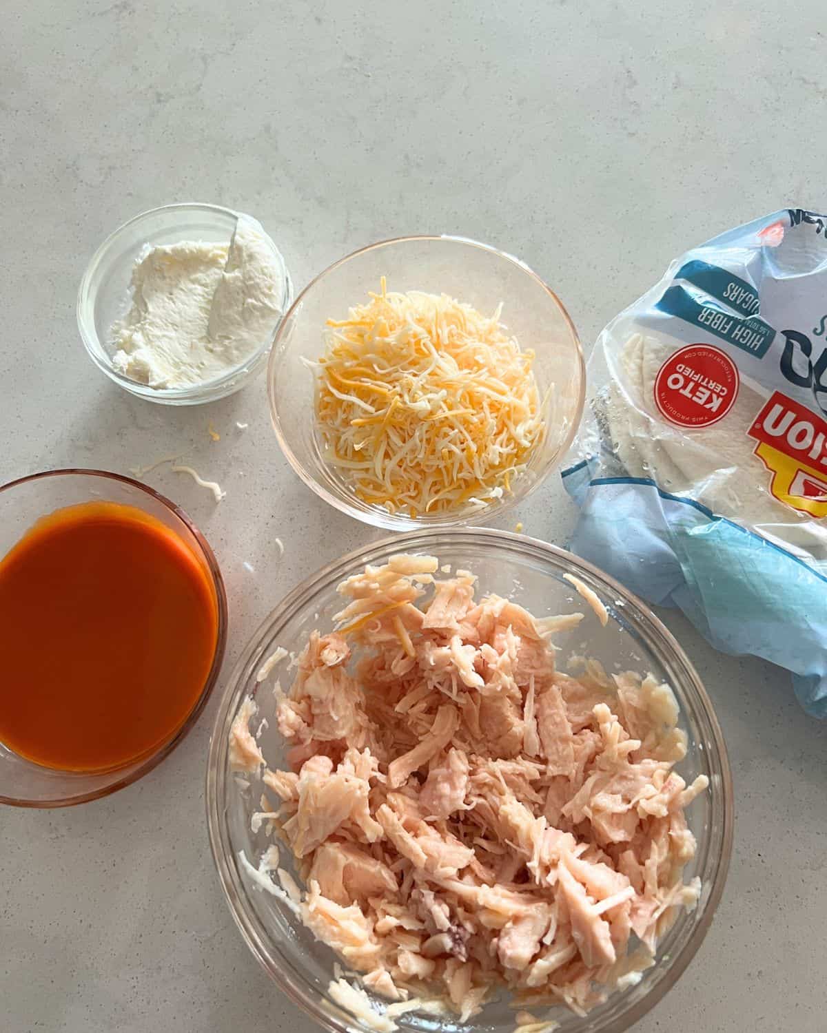 Ingredients needed for buffalo chicken taquitos. 