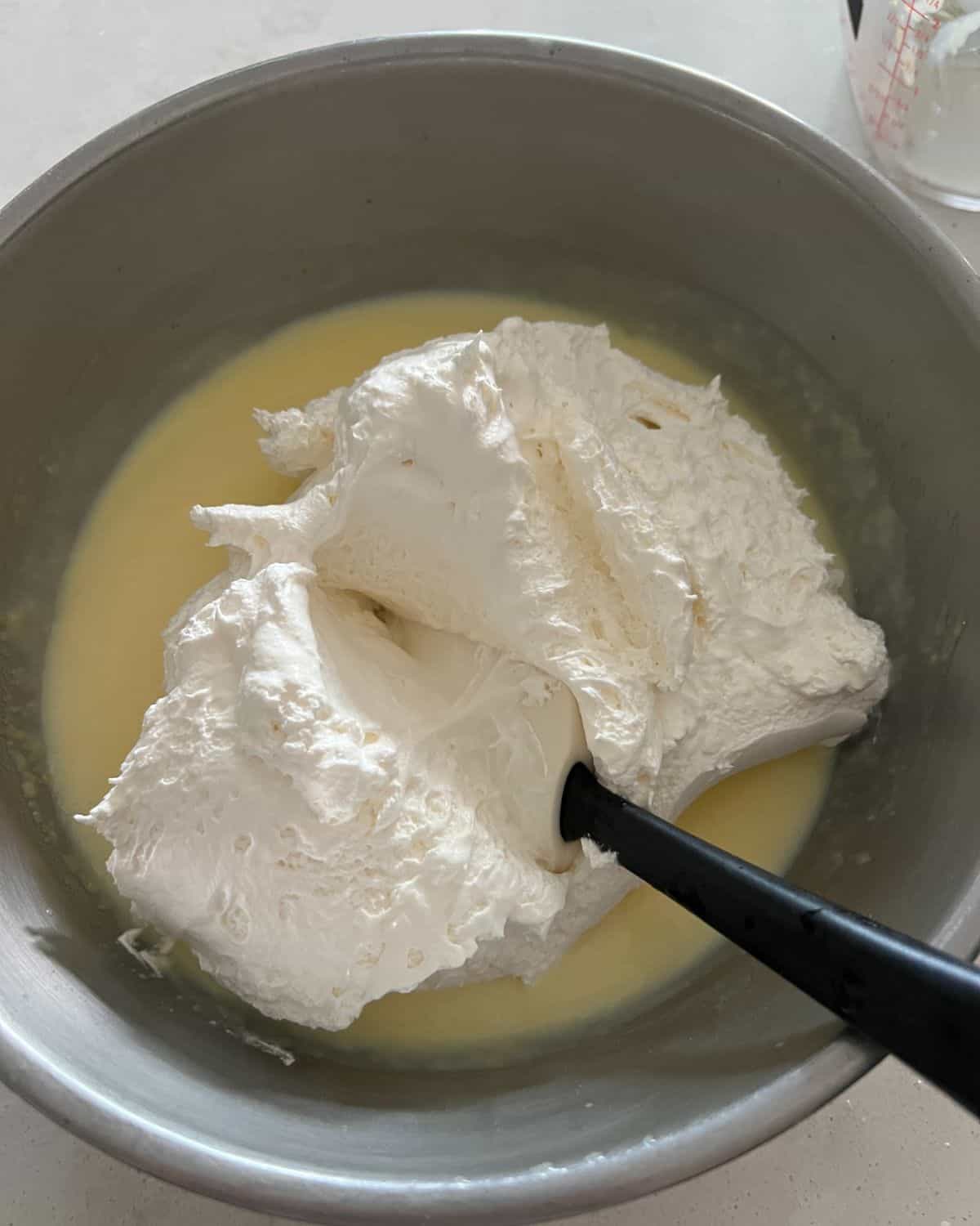 Cool whip folded into pudding.