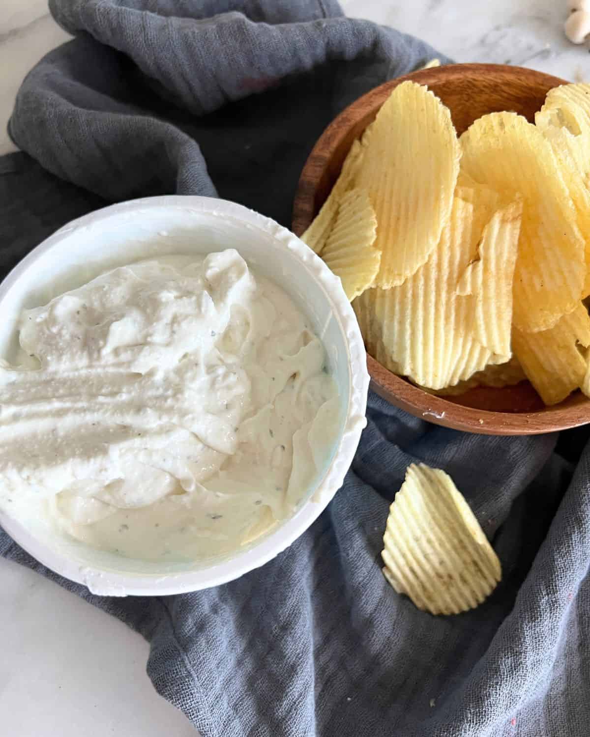Cottage cheese high protein ranch dip with ruffle chips.