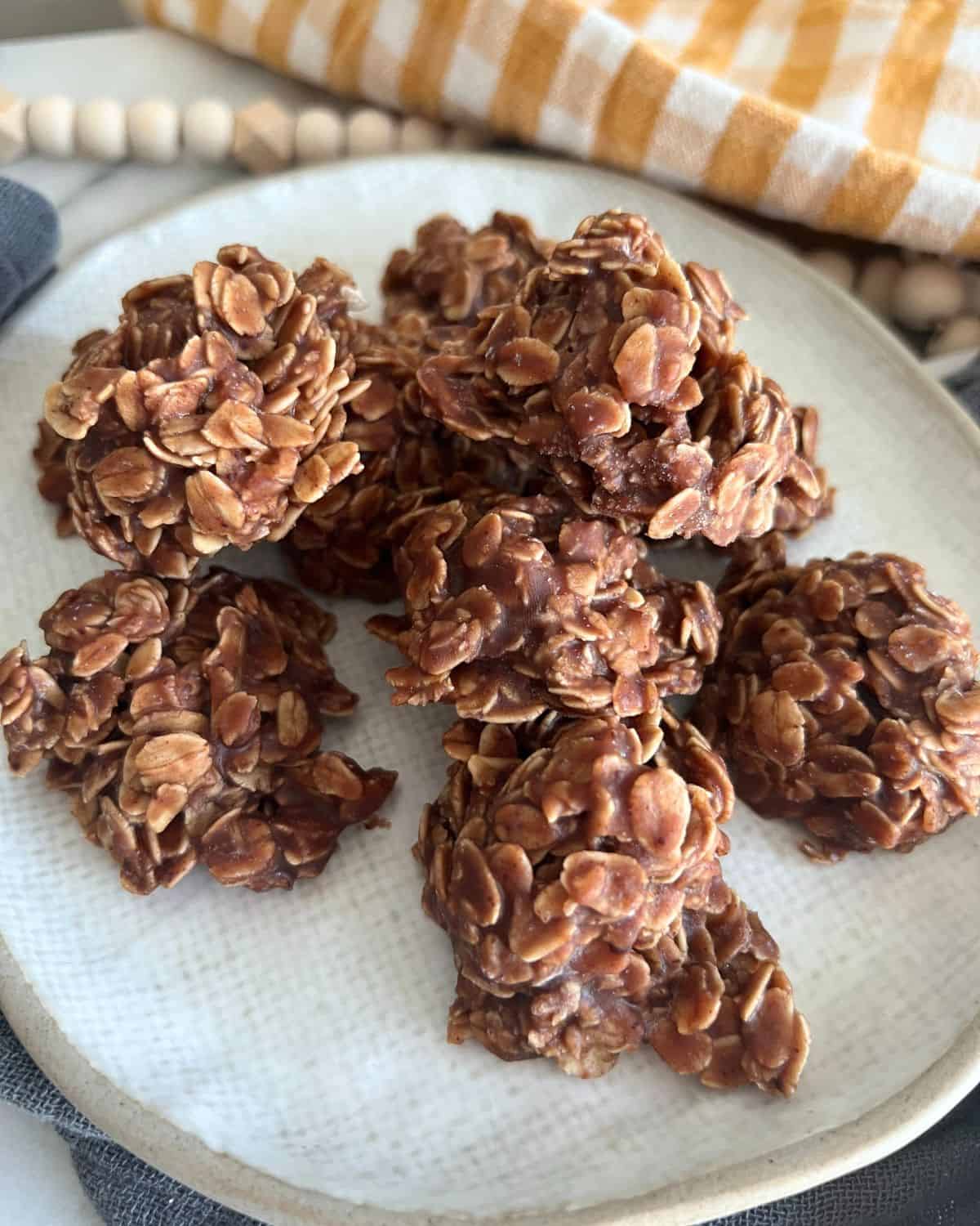 No bake chocolate peanut butter cookies on a white plate. 