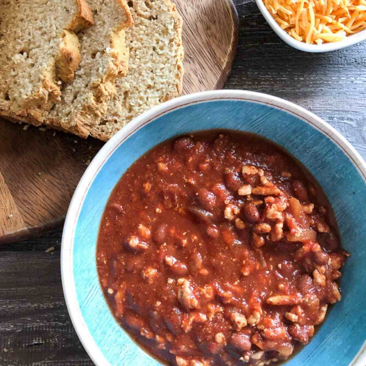Weight watchers turkey chili with cheese and bread. 
