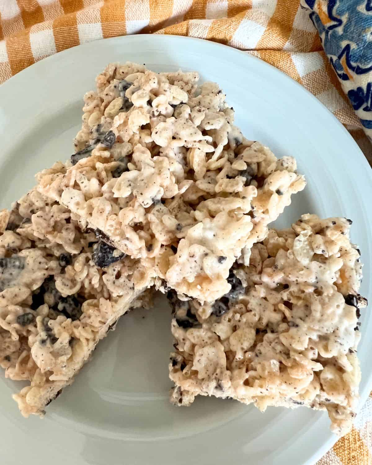 Cookies and Cream Rice Krispie Treats on a white plate. 