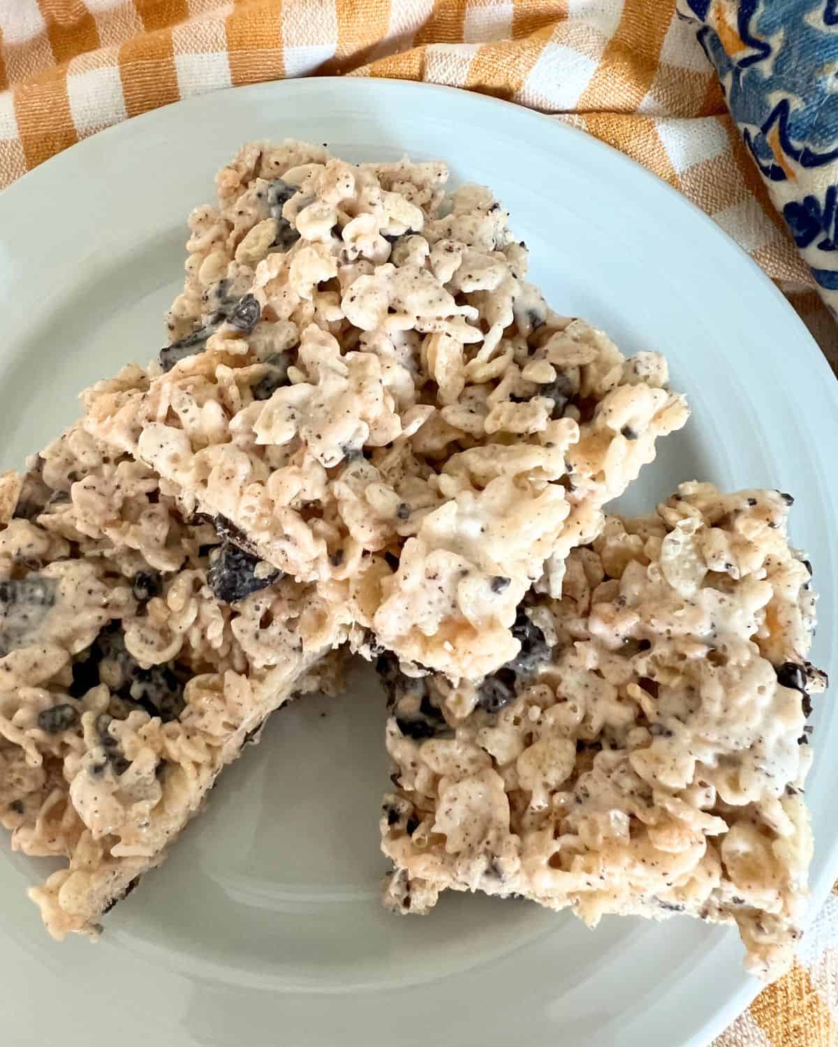 Cookies and Cream Rice Krispie Treats on a white plate.