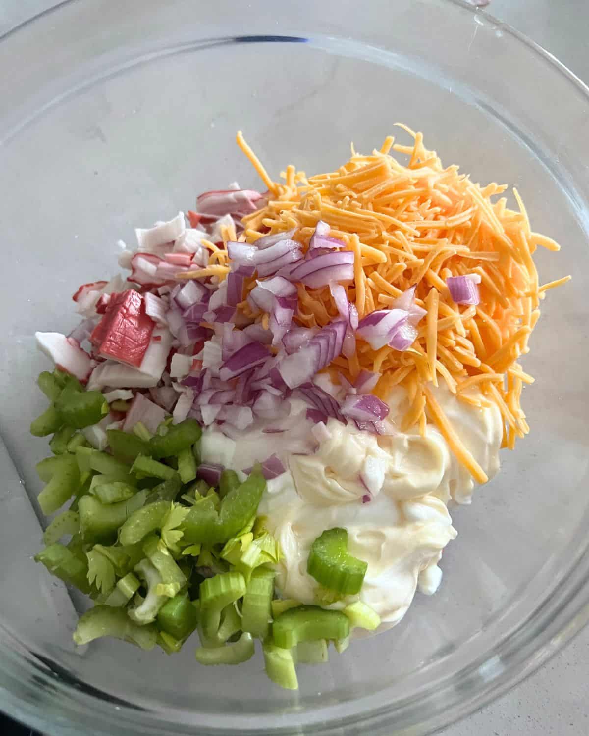 Imitation crab salad ingredients in a bowl. 