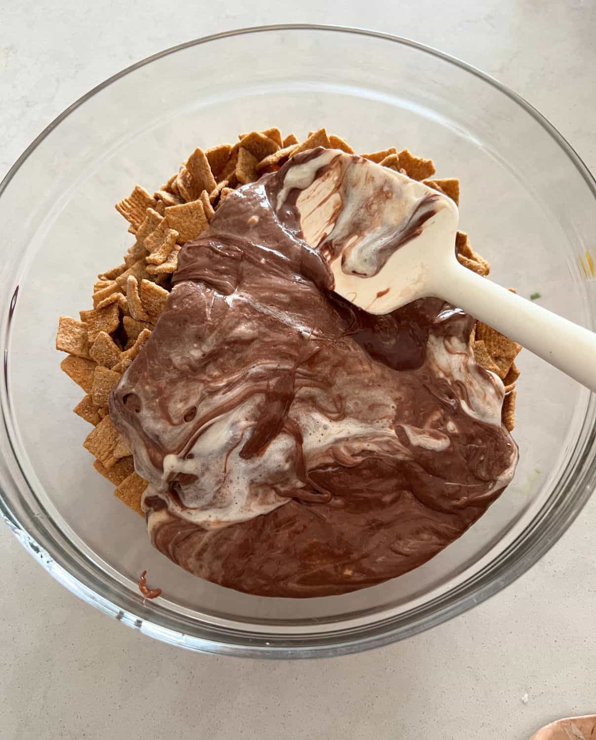 Golden Grahams and marshmallow mixture in a bowl. 