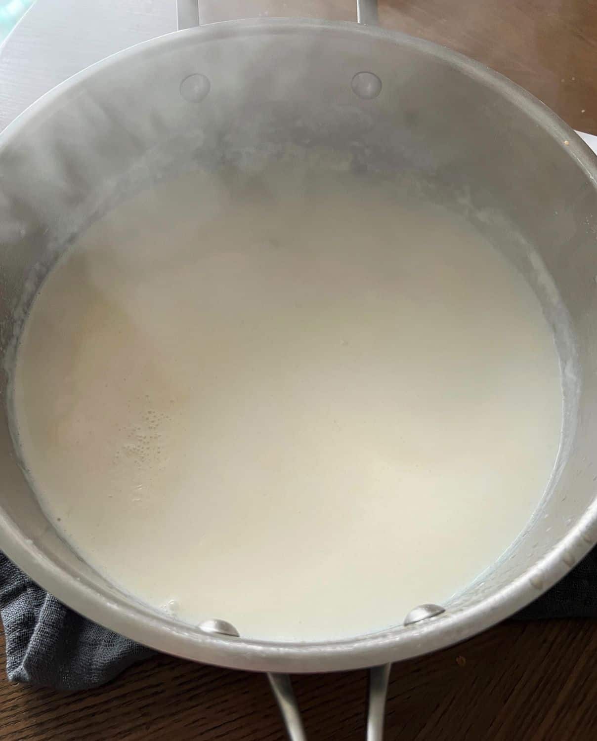 Butter, flour, and milk simmering in a pan. 