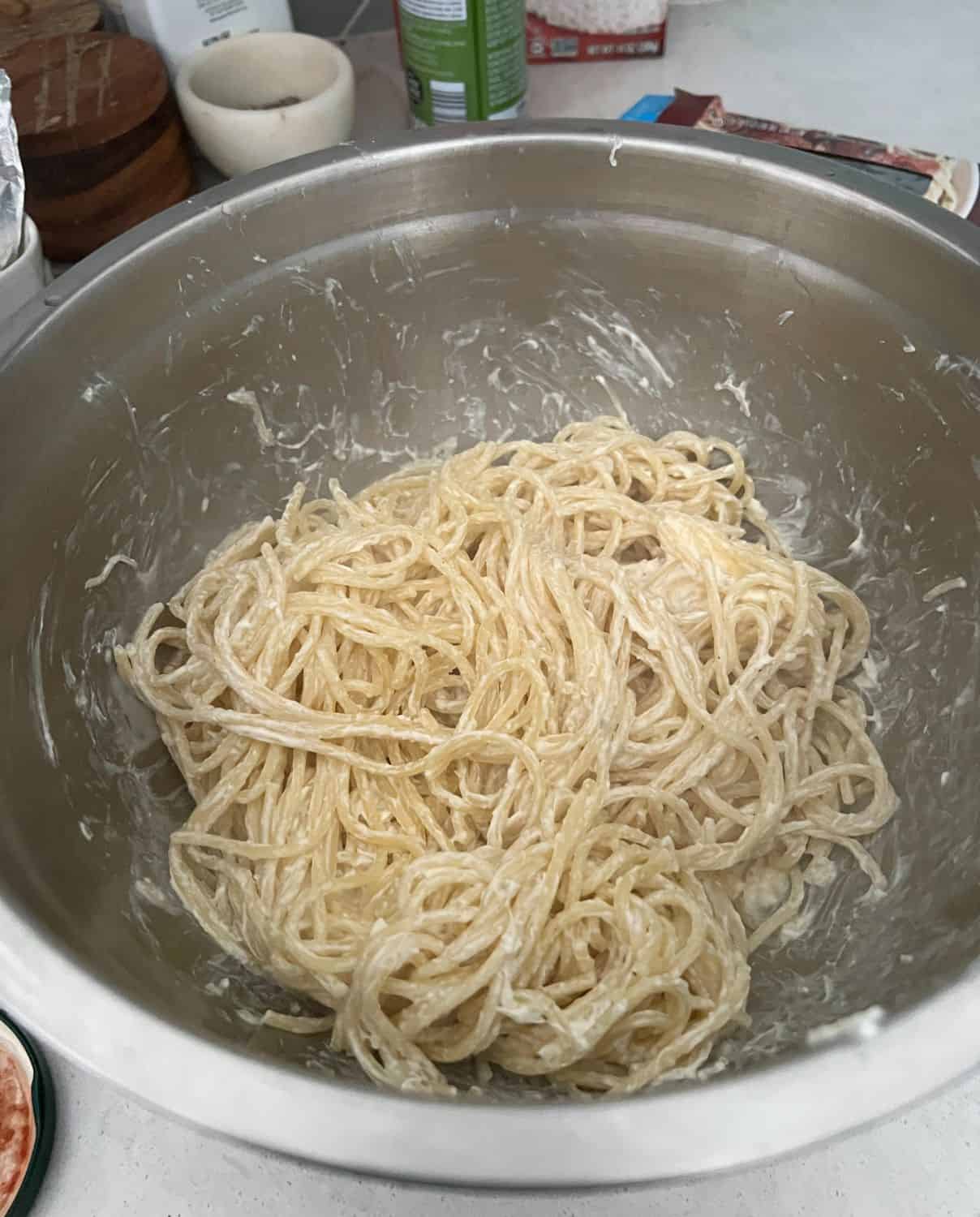 Cream cheese mixed together with noodles. 