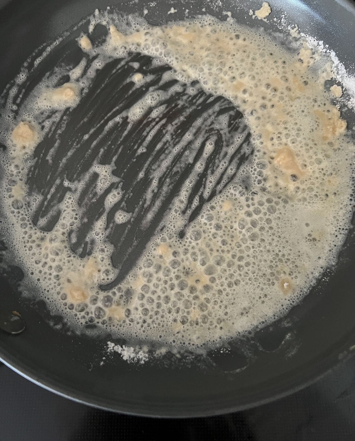 Butter and flour cooking together in a pan. 