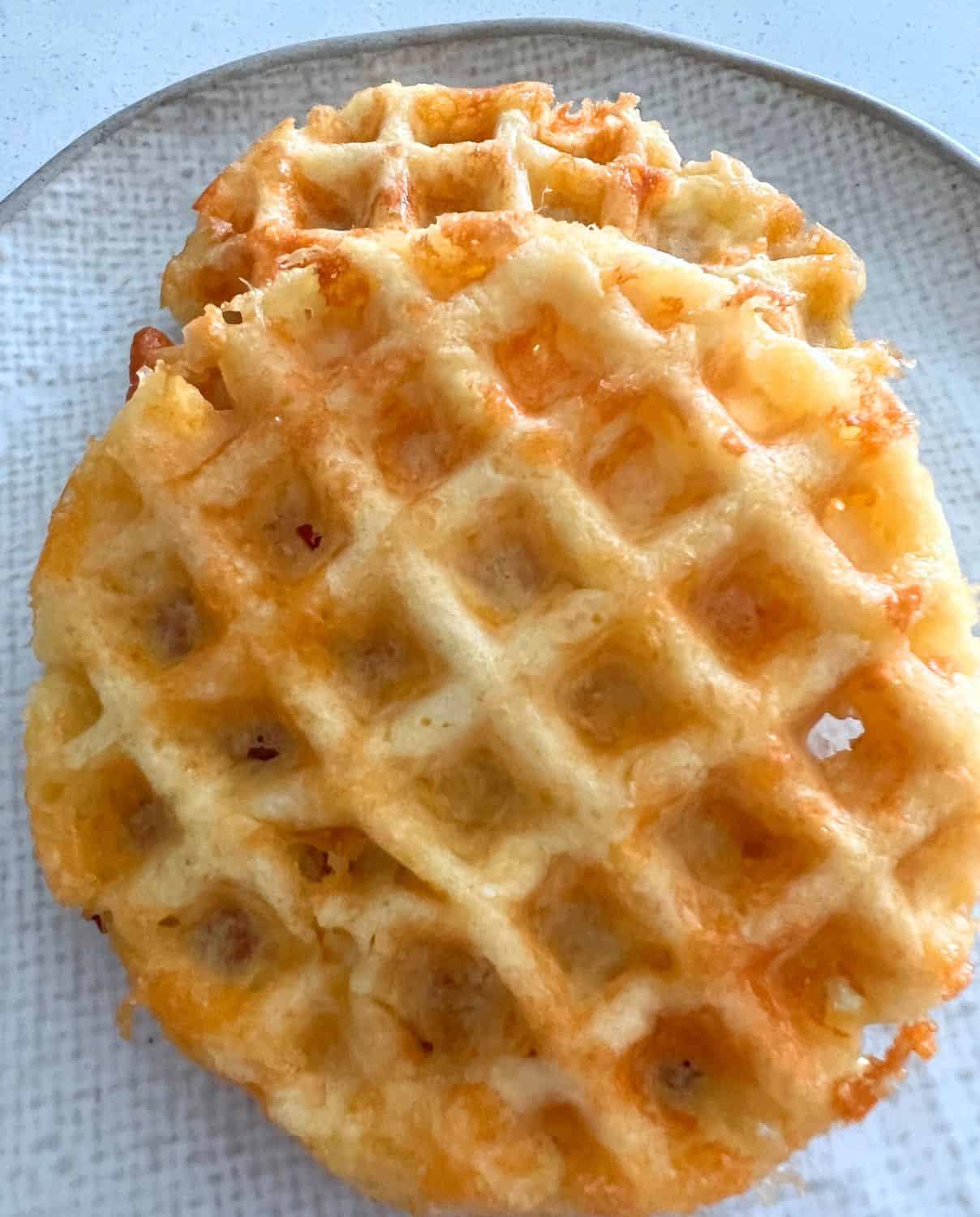 Keto chaffles on a white plate. 