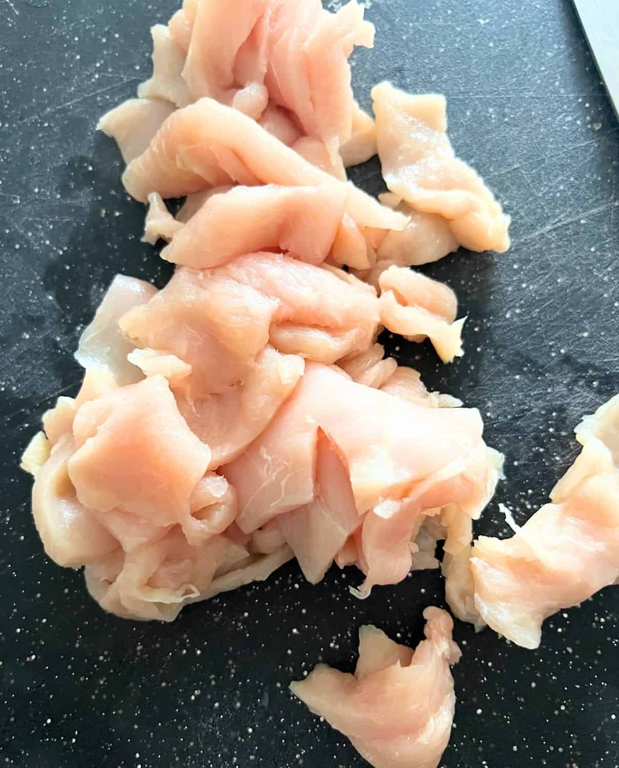 Cut up chicken in smaller size pieces. 