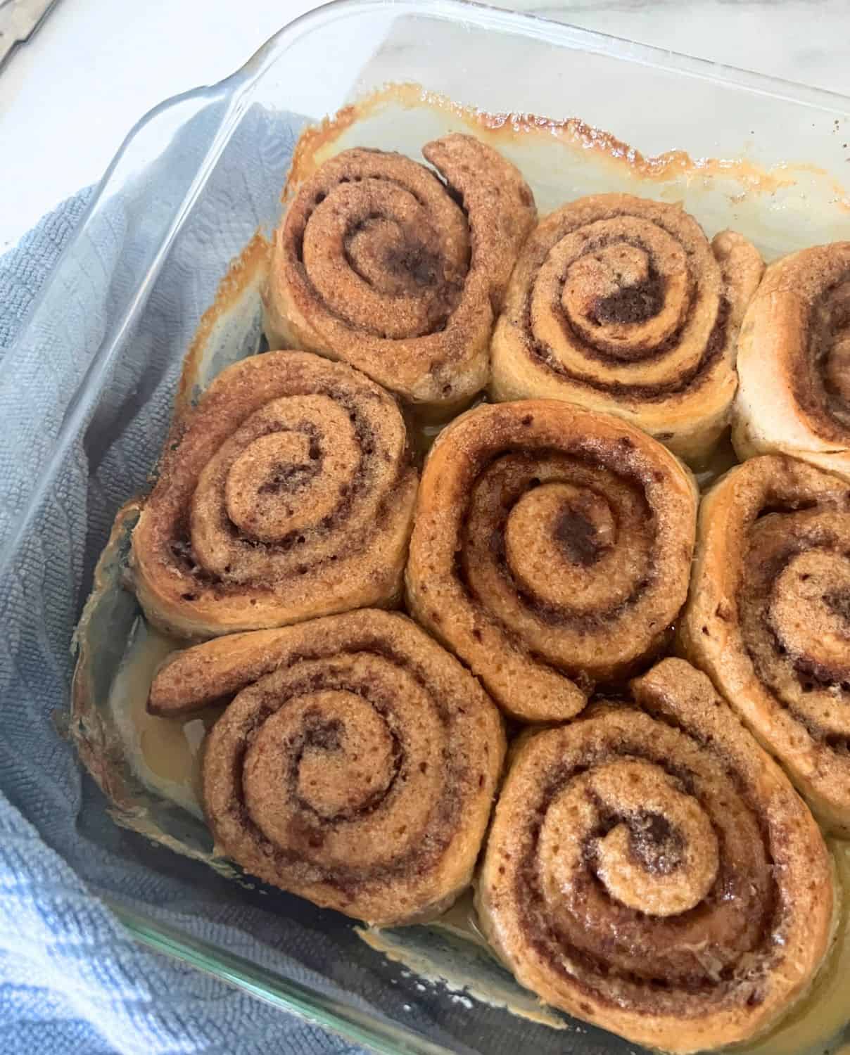Finished Baked Cinnamon Rolls in Oven. 