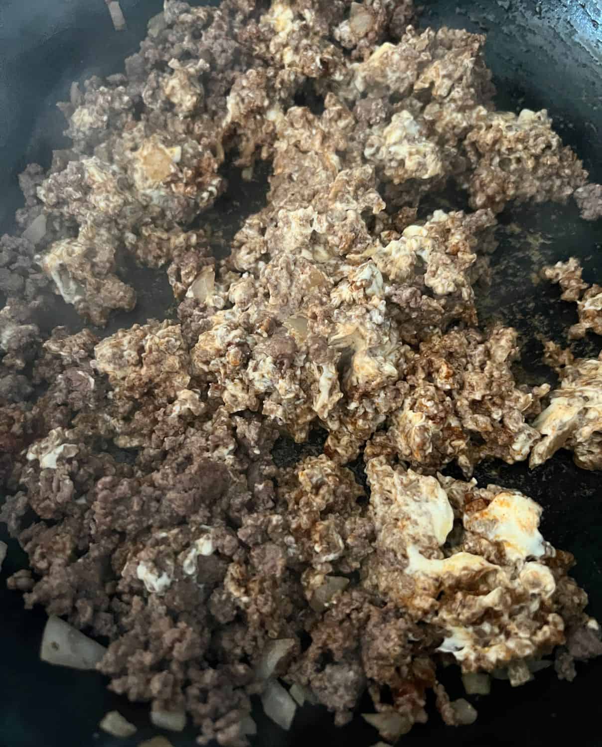 Cooked ground beef stirred in with cream cheese. 