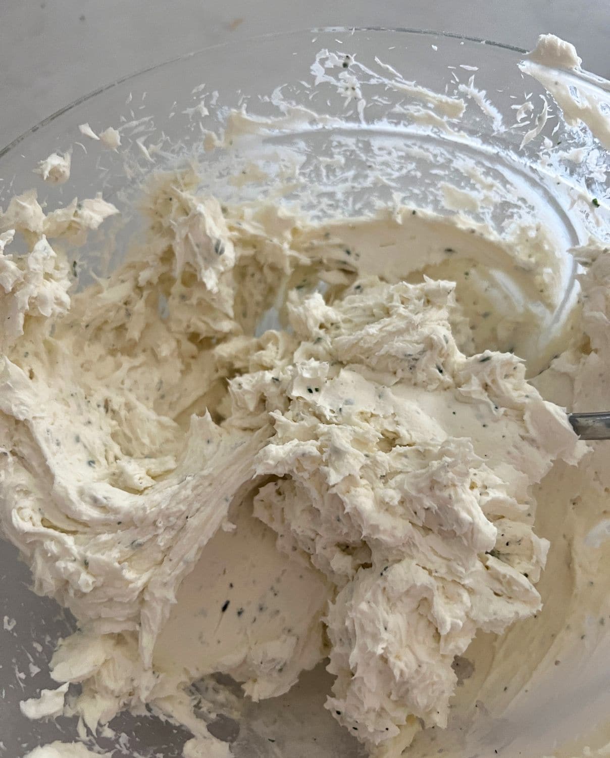Cream cheese and Ranch mixed together in a bowl. 