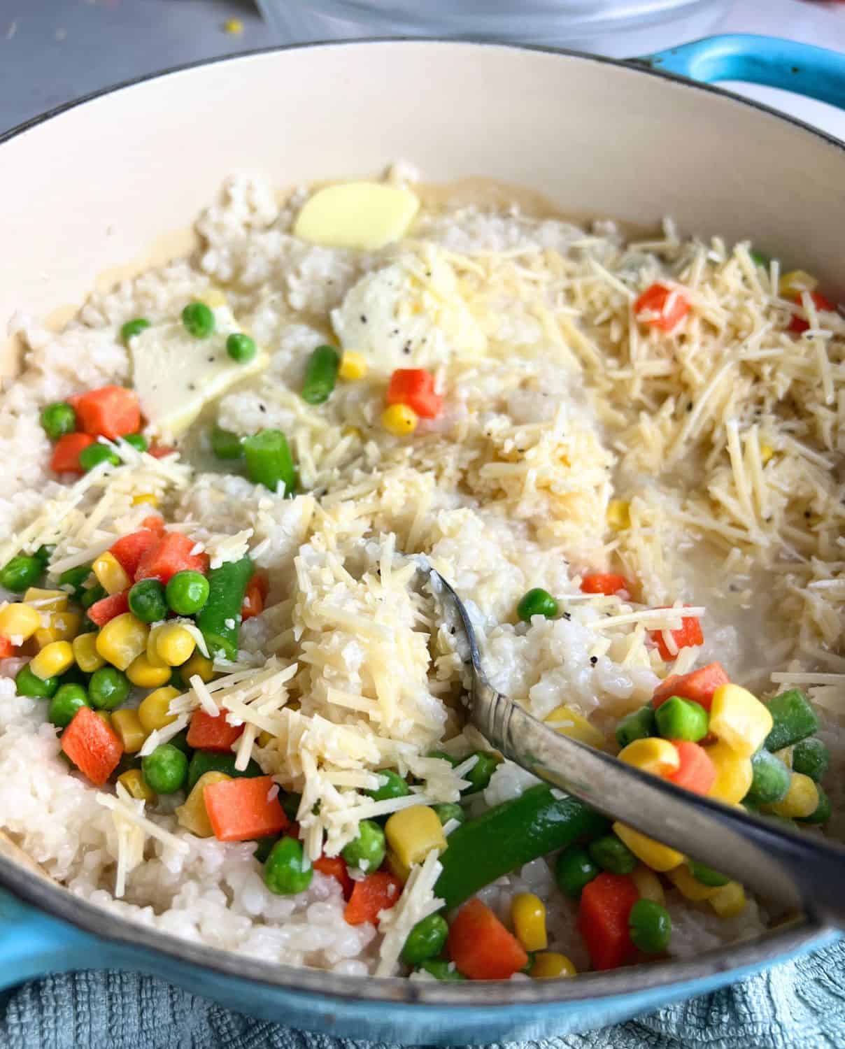 Butter, vegetables, and parmesan mixed together with the rice. 