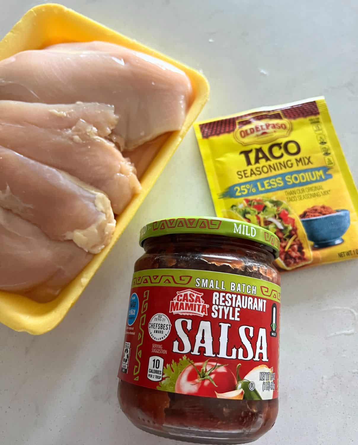 Ingredients needed for shredded chicken tacos. 