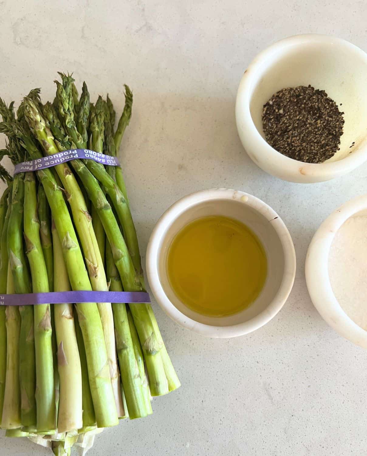 Ingredients needed for air fryer asparagus.