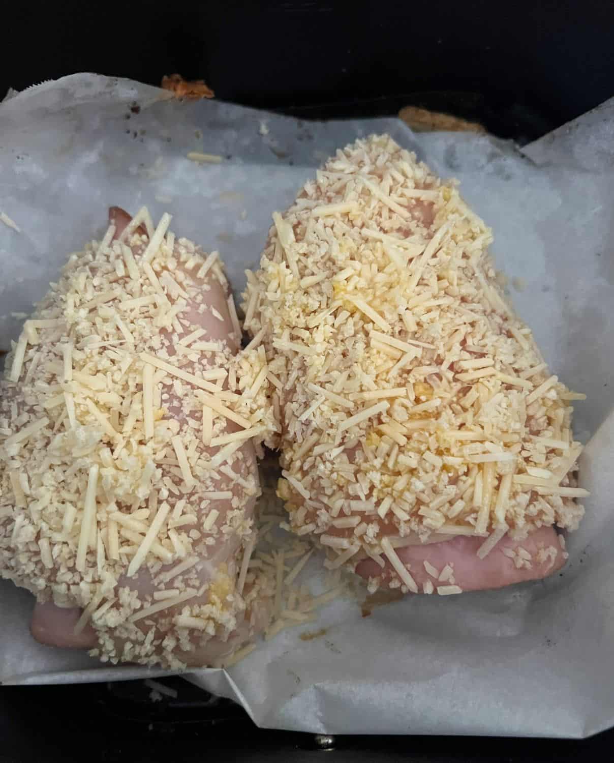 Chicken cordon bleu in air fryer basket. 