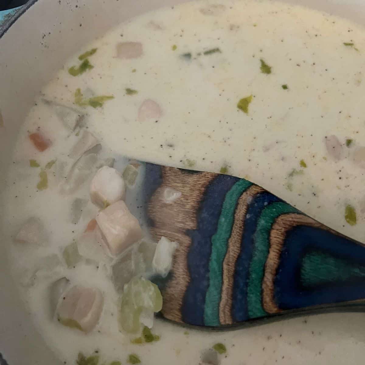 Heavy cream added to pot with the dumplings and vegetables. 