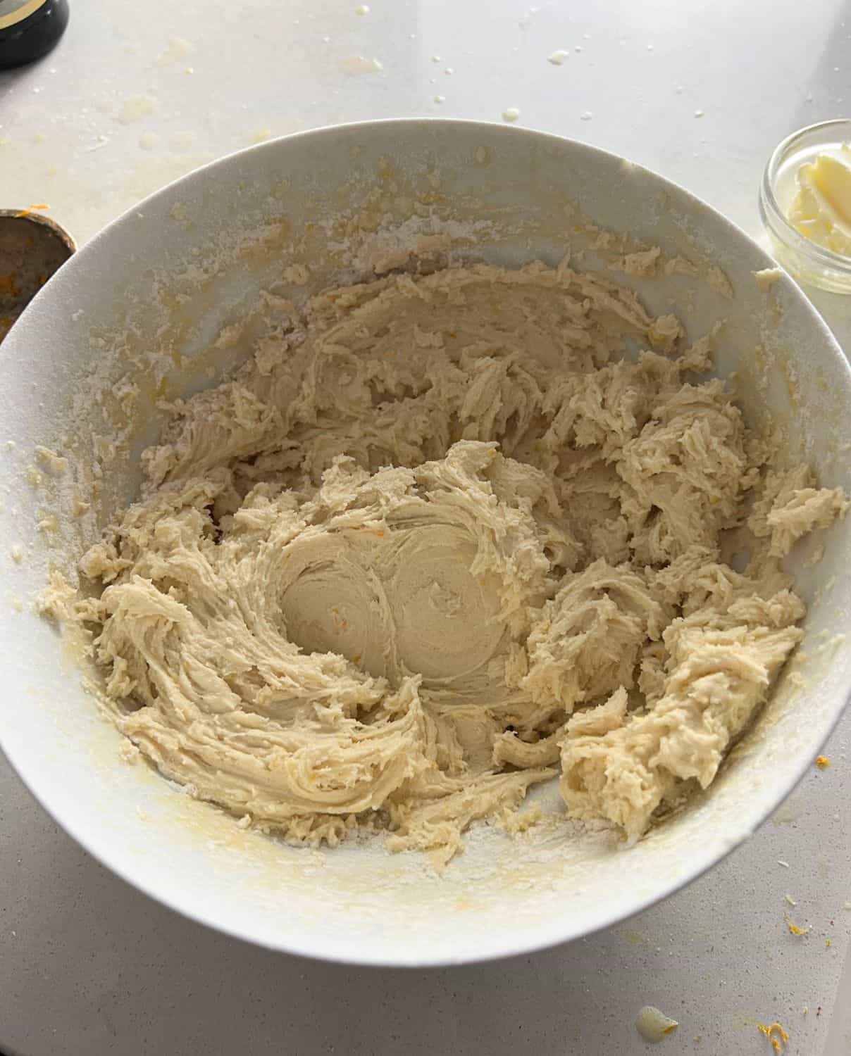 All the cookie ingredients combined in a bowl.