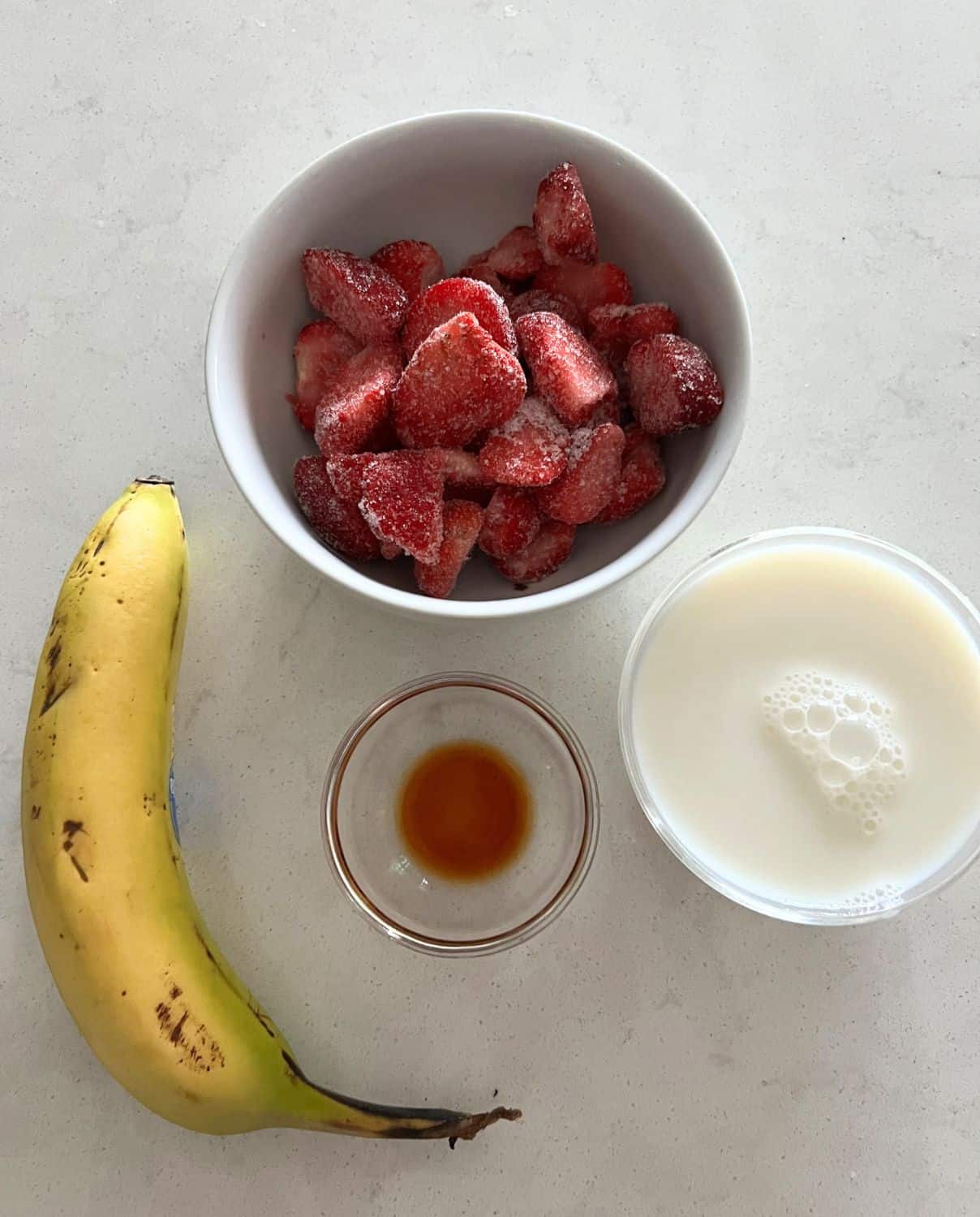 Ingredients needed for strawberry banana sorbet. 