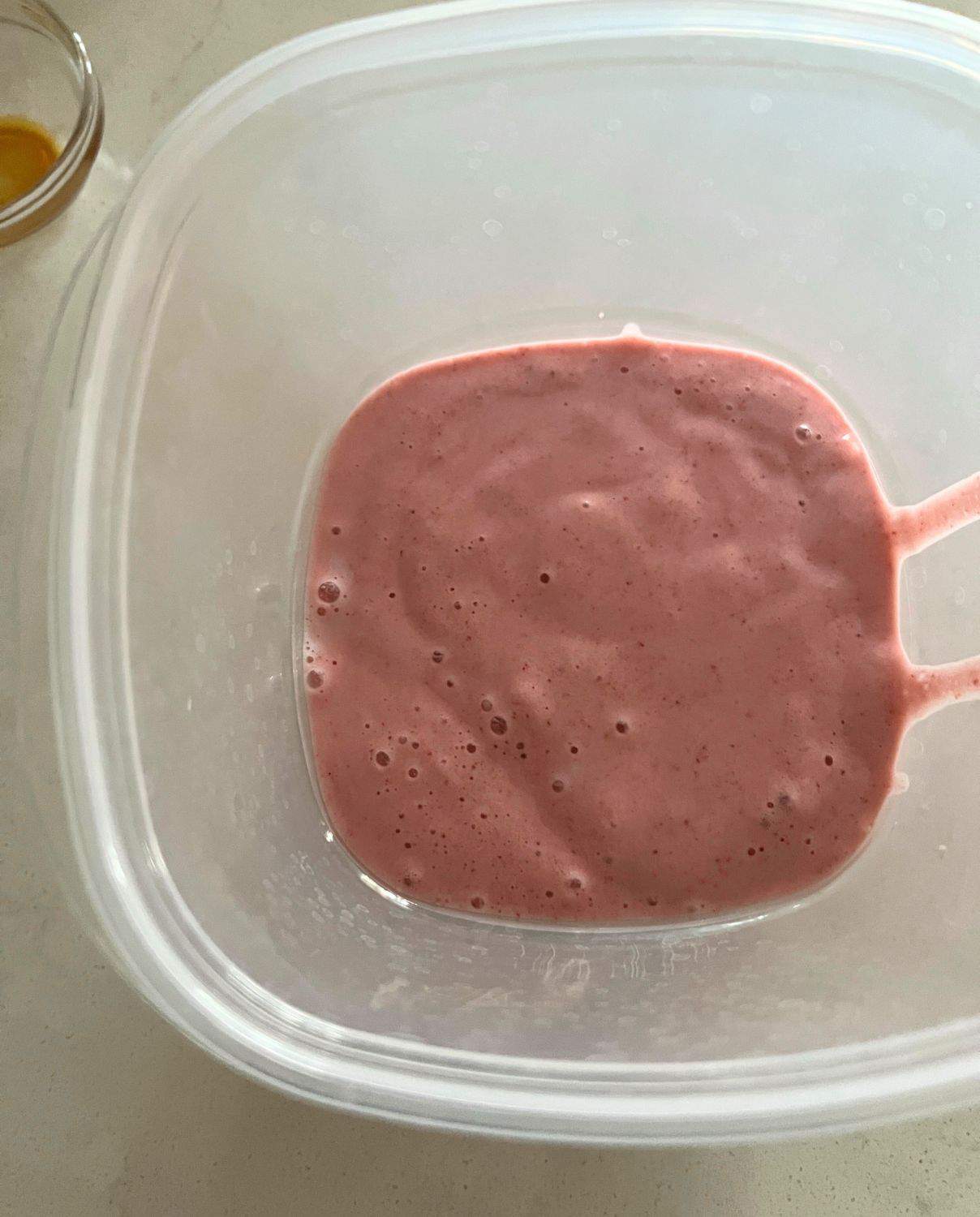 Strawberry Banana sorbet in a food storage container. 