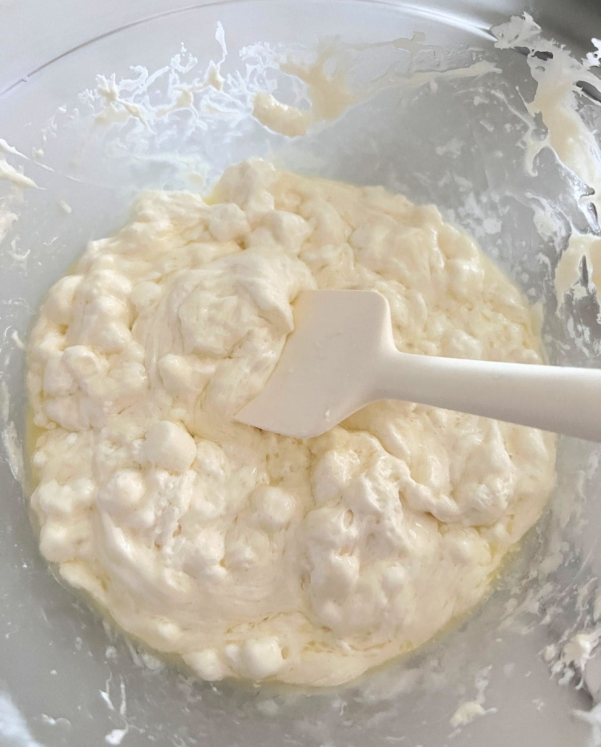Melted butter and marshmallows in a microwave safe bowl. 