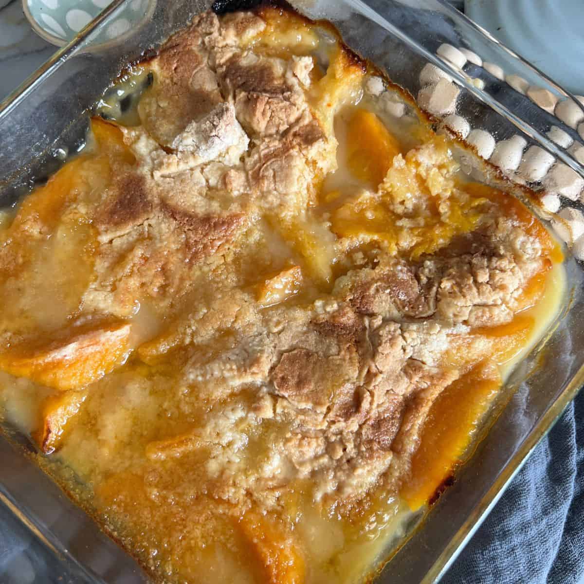 3 Ingredient cobbler in a clear casserole dish. 