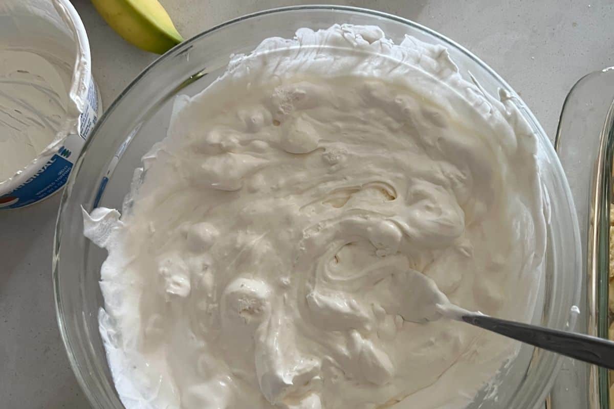 Mixed Cream cheese and condensed milk mixed together in a bowl. 
